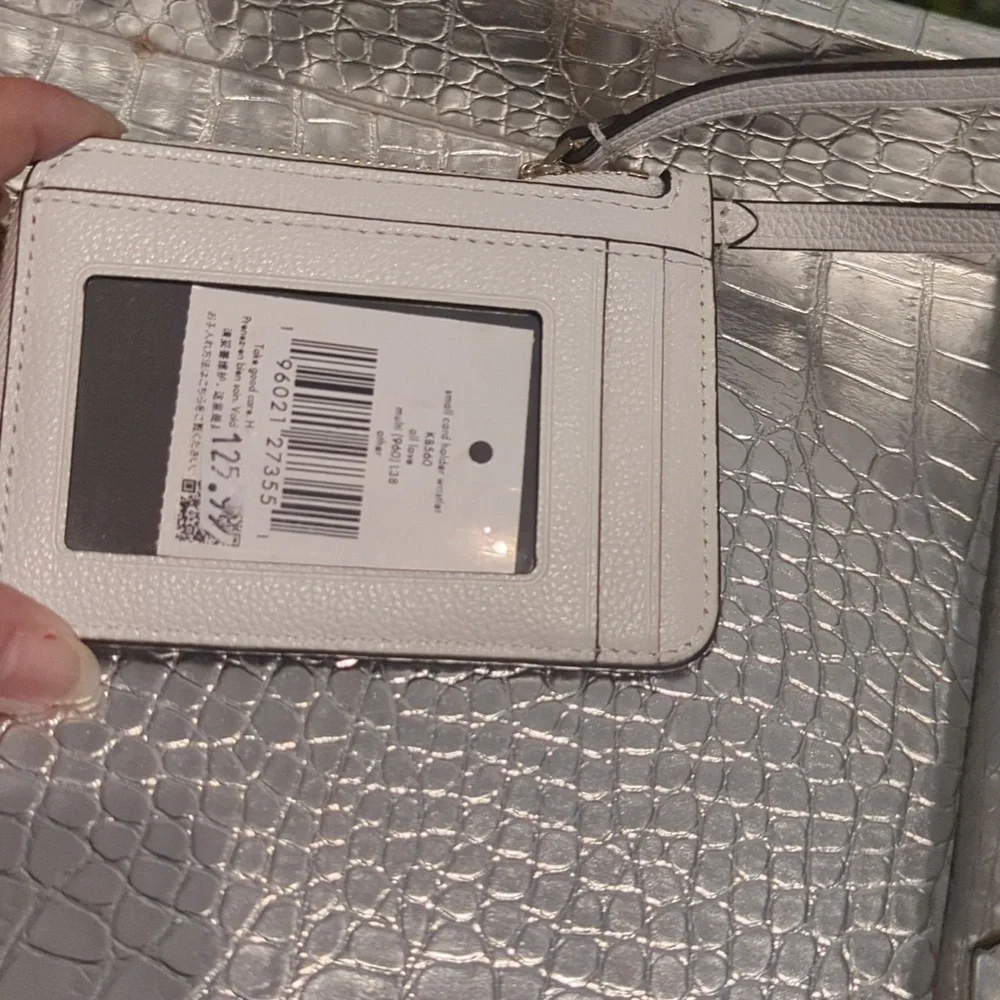 Kate Spade small cardholder wristlet with extendable strap